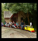 Diesel train near replica gatekeeper house